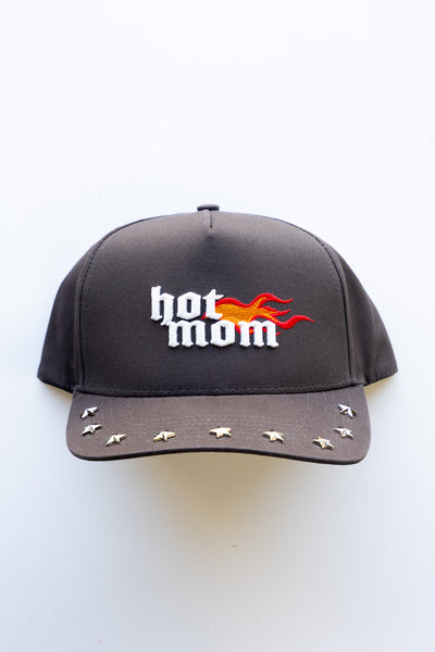 Black cap with 'hot mom' text and flame design on a white background
