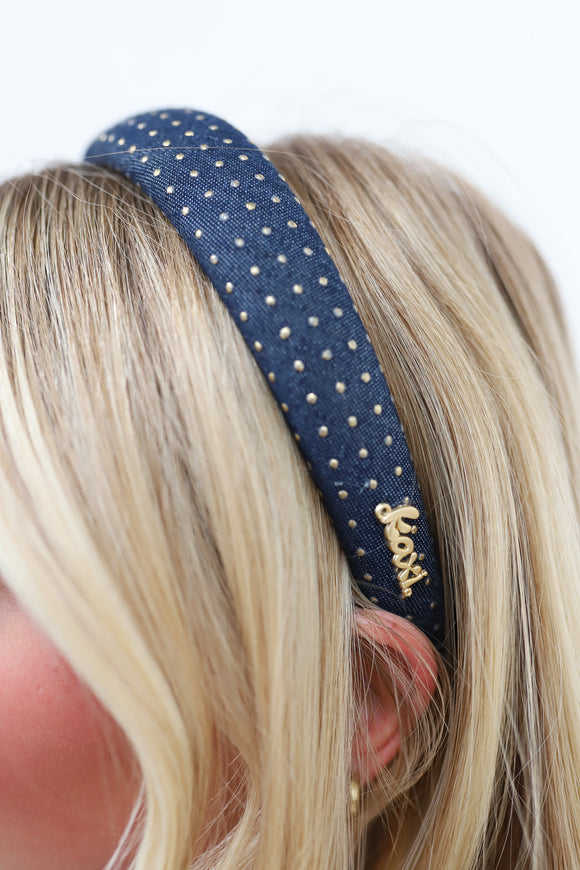Navy blue headband with studs, with gold "kaxi" char on the side.