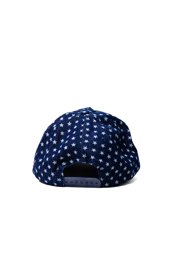 Navy blue cap with white star pattern on a white background