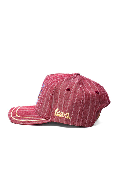 Red striped cap with 'Kaxi' logo on a white background