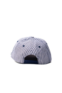 Striped cap with blue and white pattern on a white background