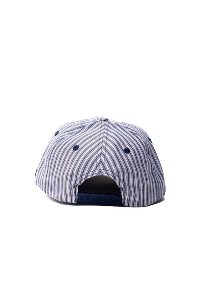 Striped cap with blue and white pattern on a white background