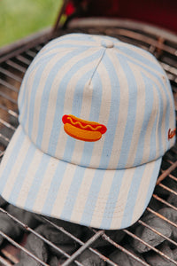 striped baseball cap with a hot dog embroidered on the front